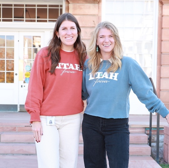 Two women on the porch of Council Hall, Salt Lake City