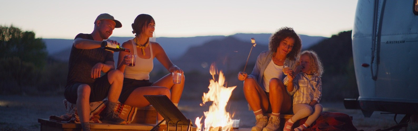 Campers around camp fire